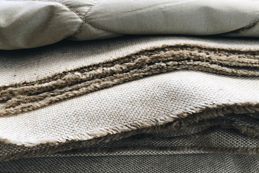 Unraveling the Fabric of Comfort: A Deep Dive into Cotton, Linen, Bamboo, and Silk Bed Linens