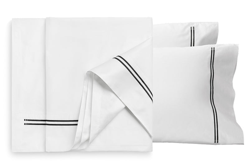 Classique Sheet Set in white cotton sateen with ebony satin stitch lines
