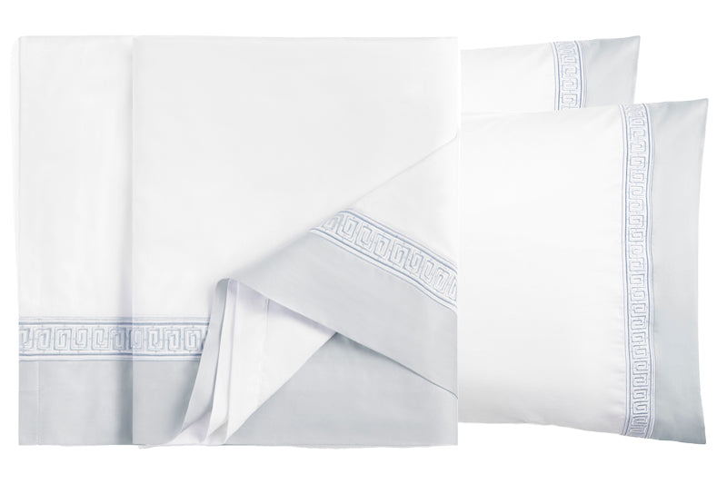 Flaxfield Linen Rhodes Flat Sheet Set, displayed in elegant Grecian Blue, featuring intricate Meander patterns and made from luxurious 400-thread count long-staple cotton sateen for a refined bedroom look.